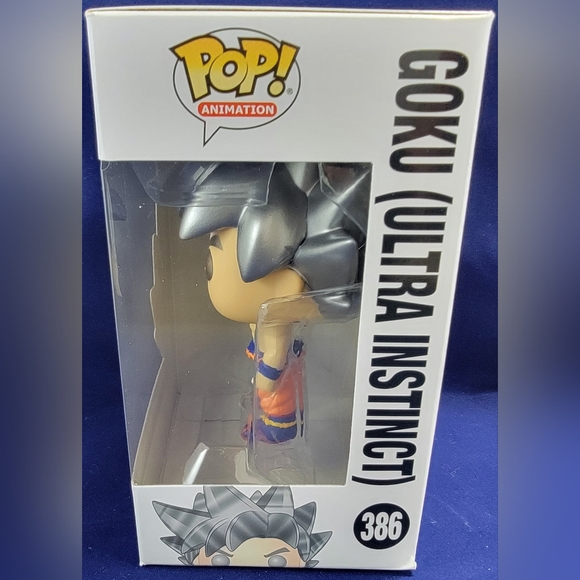 Goku (ultra instinct) funko # 386 (nib) with pop protector - Picture 5 of 7